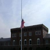 Lowering the flag.