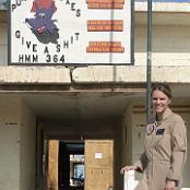 Capt Jennifer Harris and the Purple Fox sign in Iraq. Photo courtesy of Tony and Linda Macone. 