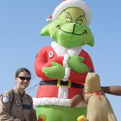 Capt Jennifer Harris visits the Grinch in Iraq. 2006. Photo courtesy of Tony and Linda Macone. 