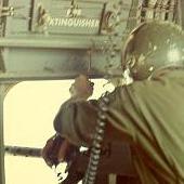 Cpl James H. Bandish as door gunner on the left side of a CH-46 - 1969. Photo courtesy of Jim Bandish.