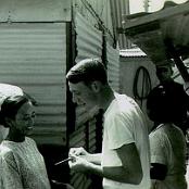 Corpsman Walter "Rip" Tyrrell treating Vietnamese villagers - 1968. Photo courtesy of the Tyrrell family.