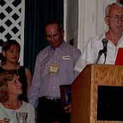 Ernie Cunningham reading citation for Combat Aircrew Wings for Gary Young. Me with Gene Brady and Jan Bartolina looking on - October, 2002. Photo courtesy of Bob Steinberg.