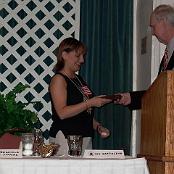 Me accepting miniature Combat Aircrew Wings from Doc Clay Linkous - October, 2002. Photo courtesy of Bob Steinberg.
